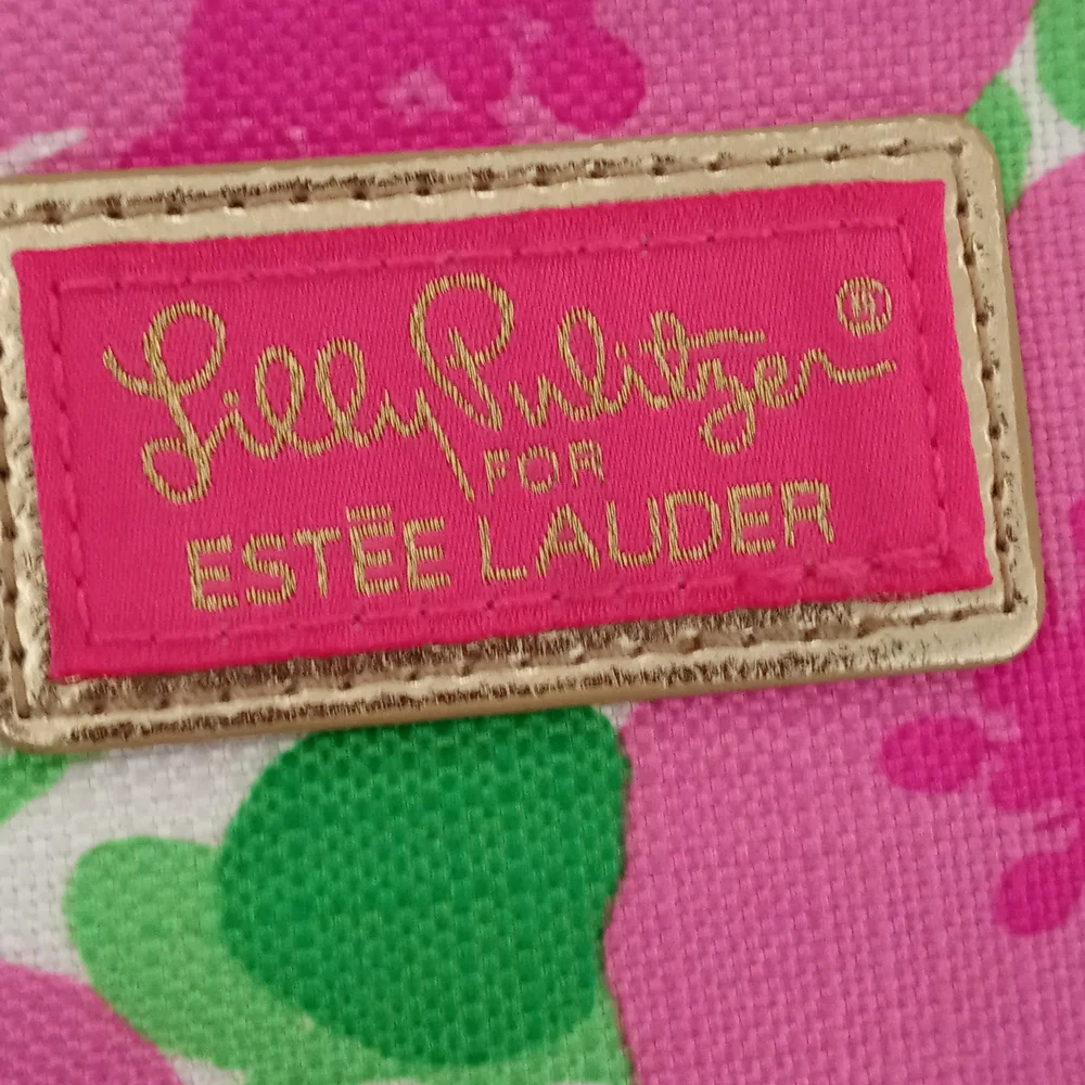 Estée Lauder zip mini bag
